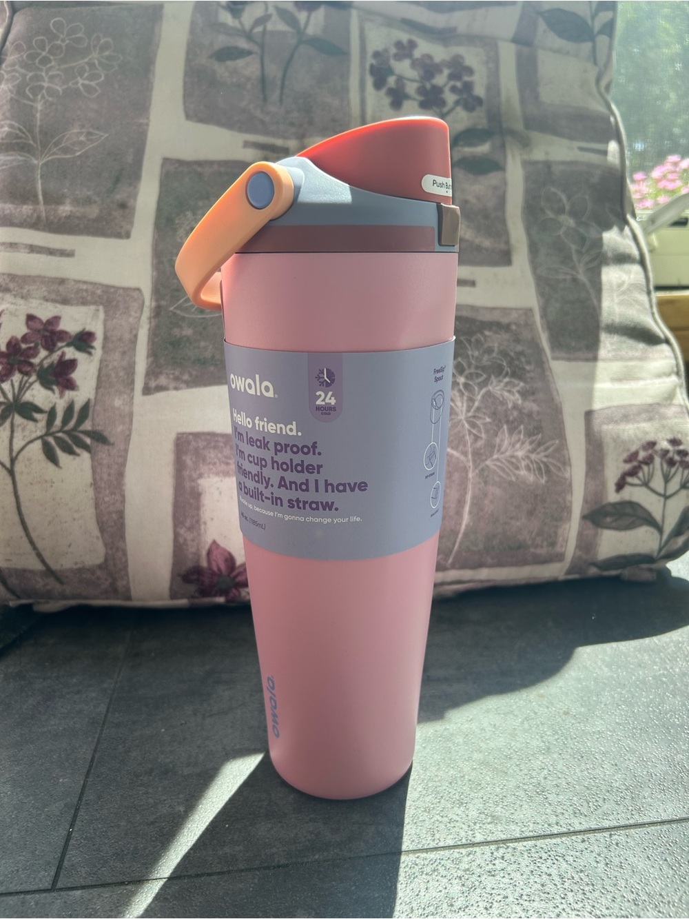 Owala Pink Insulated Bottle with Built-In Straw. Tapered bottom fits cup holders